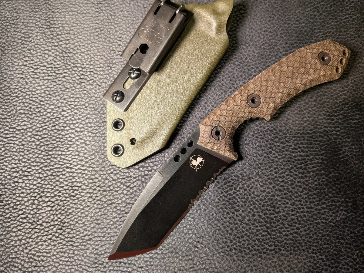 AtraxTac knife beside an olive Kydex sheath with ULTICLIP XL