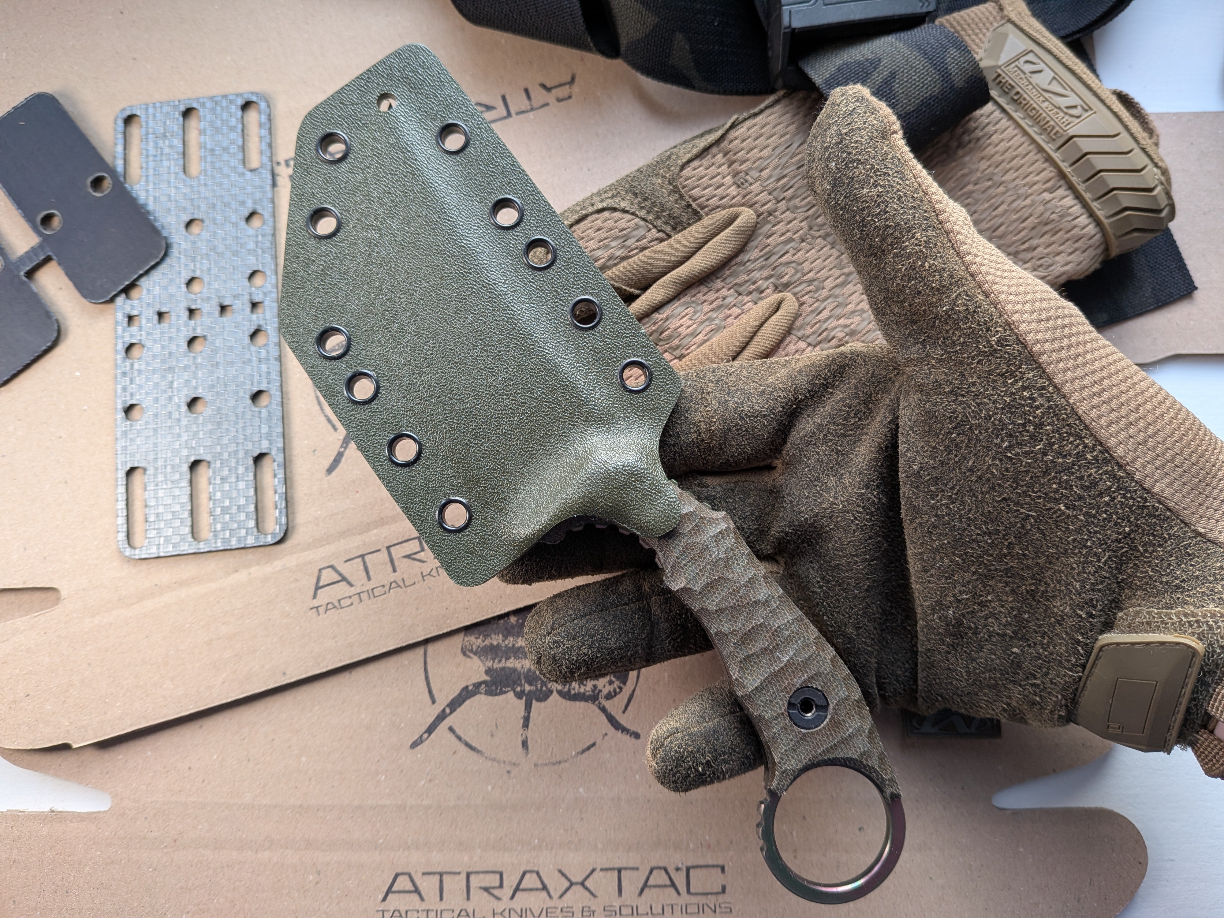 Atrax Plague ARC ta-C coating, green canvas micarta handle and Olive kydex
