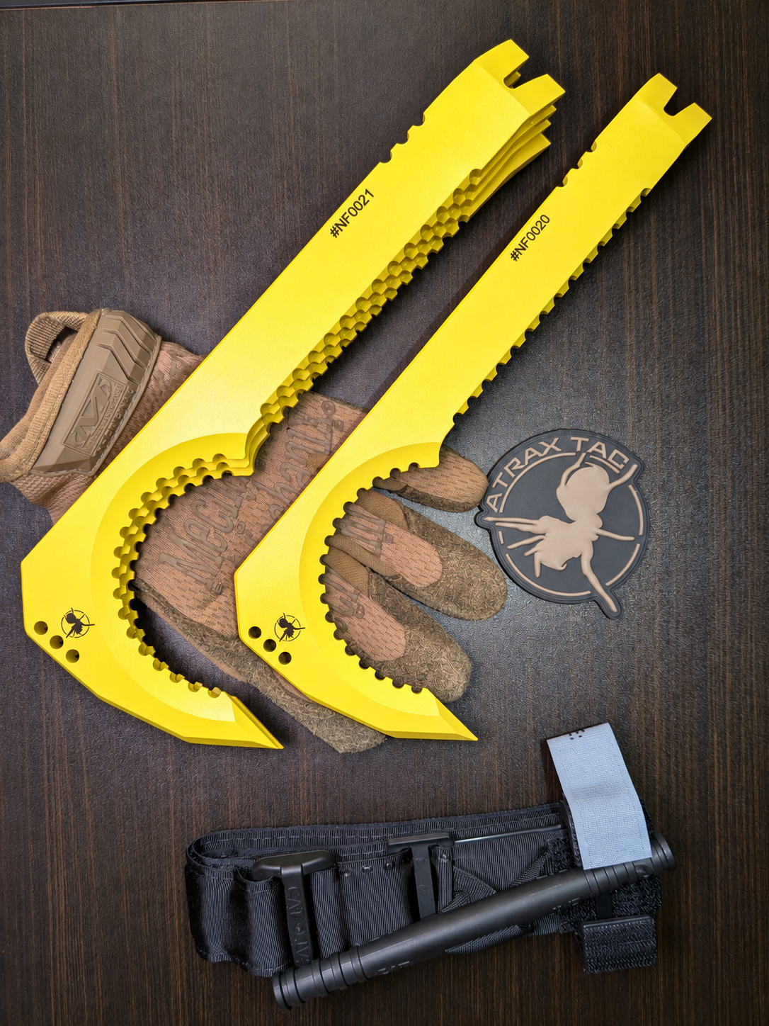 Atrax NFORCE in Lemon Zest Cerakote, original scene with tactical gloves, view 1