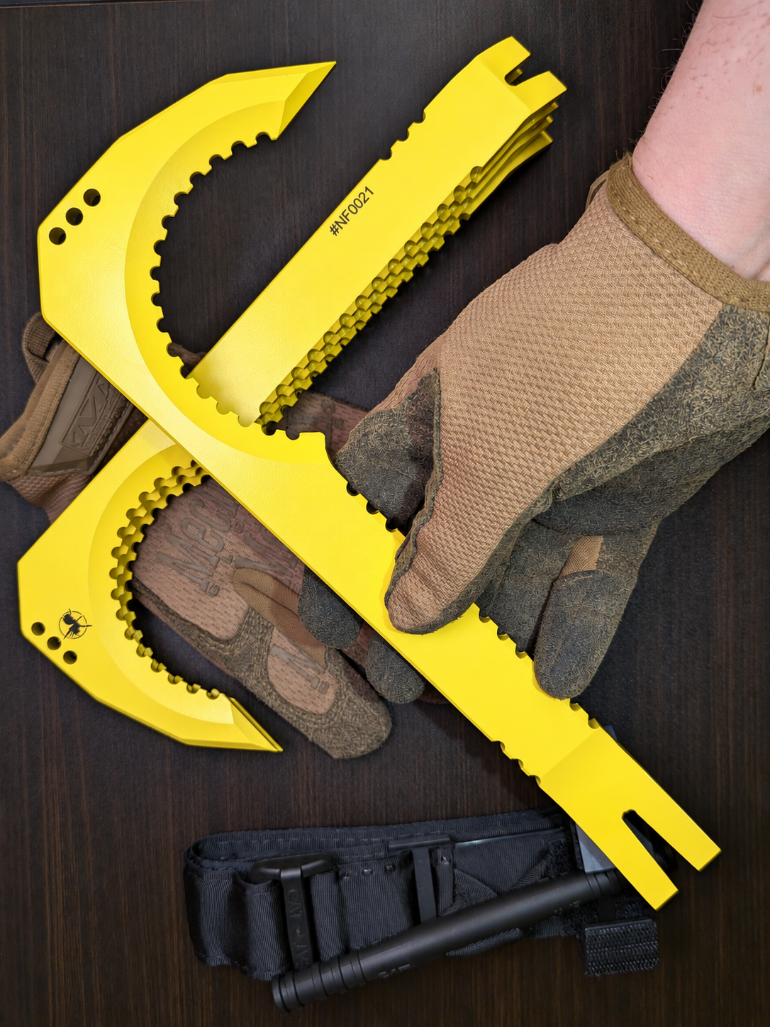Atrax NFORCE in Lemon Zest Cerakote, original scene with tactical gloves, view 3