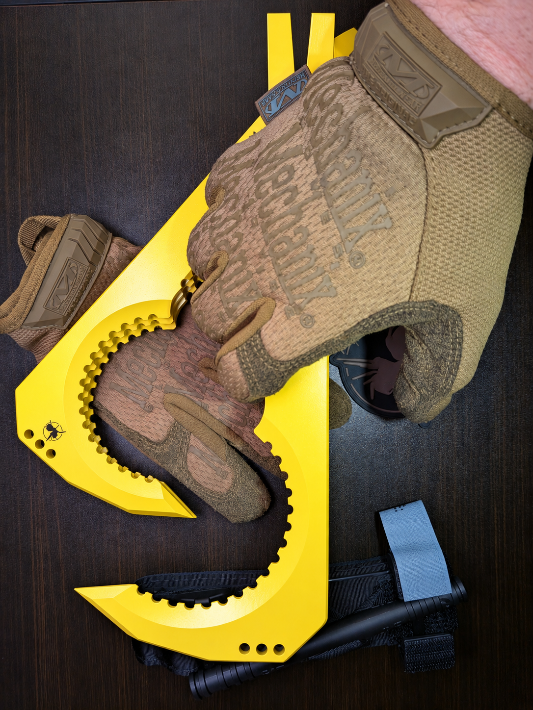 Atrax NFORCE in Lemon Zest Cerakote, original scene with tactical gloves, view 6