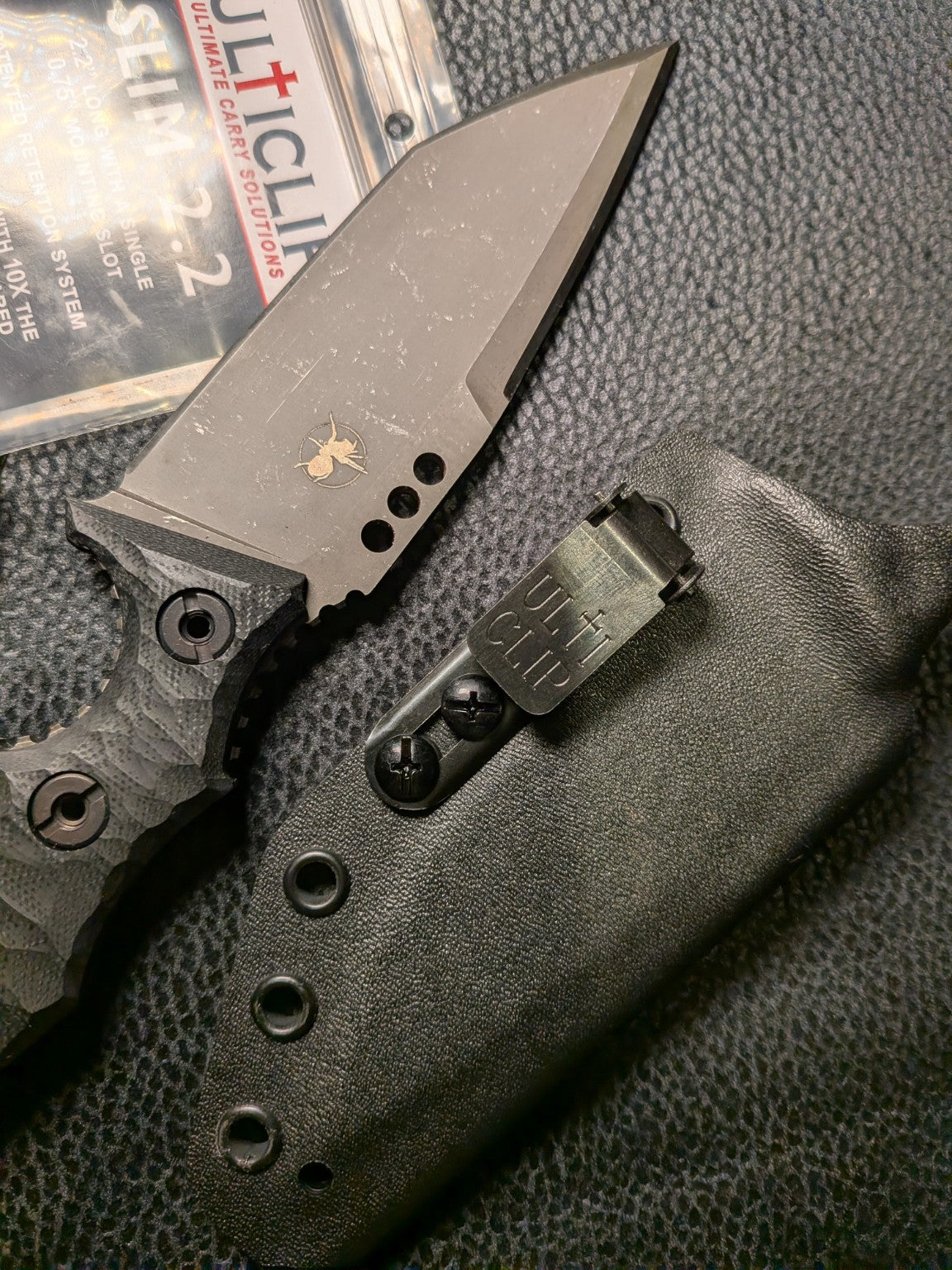 SLIM 2.2 on an AtraxTac black Kydex sheath